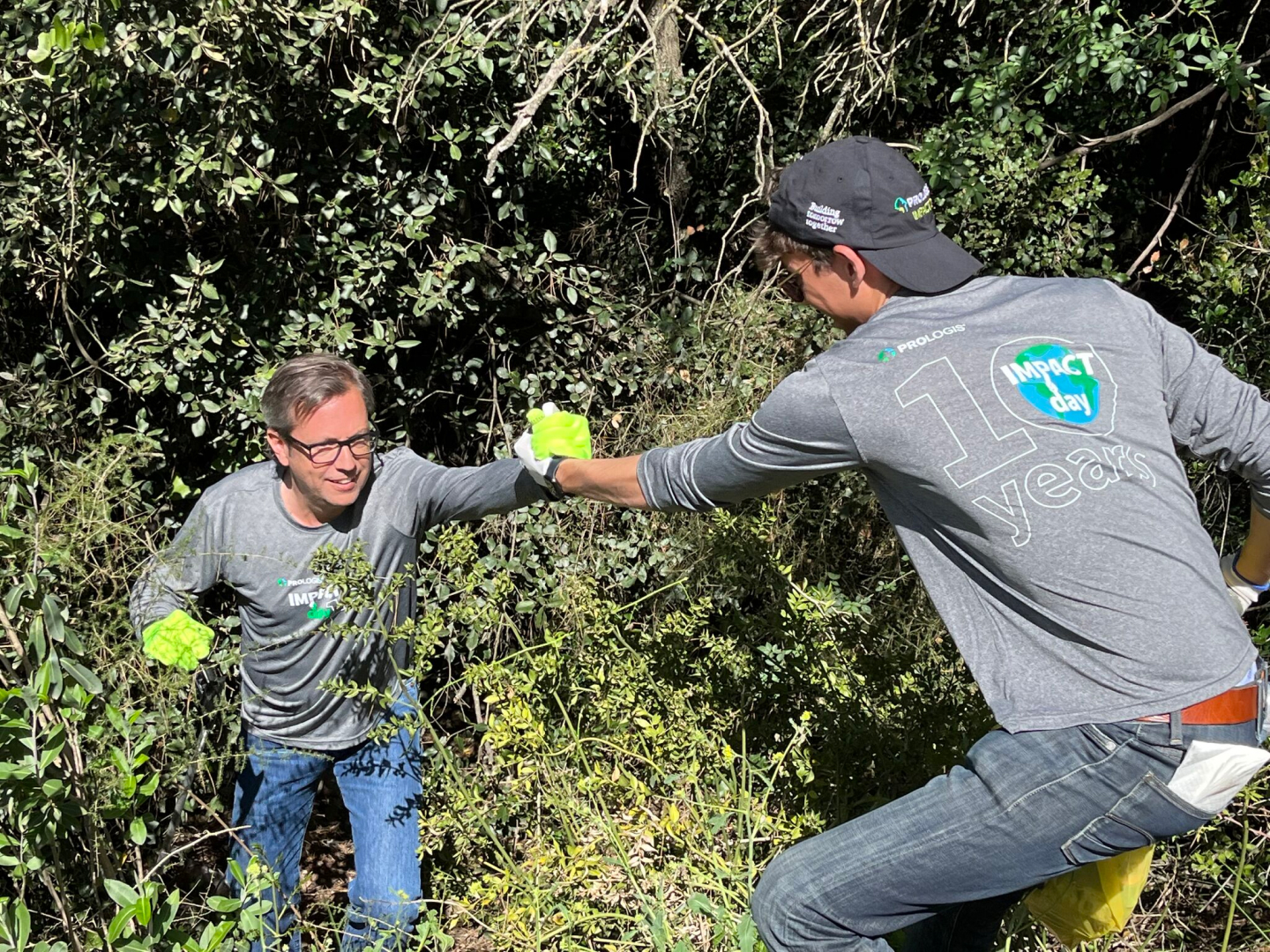Two men work on Impact Day 2022 Two men work on Impact Day 2022
