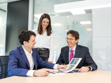 Three members on meeting at the office Three members on meeting at the office