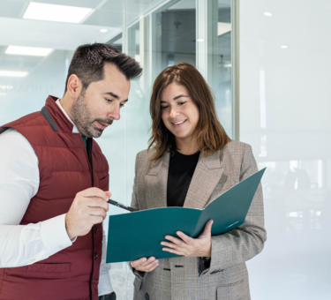 Two members check file together